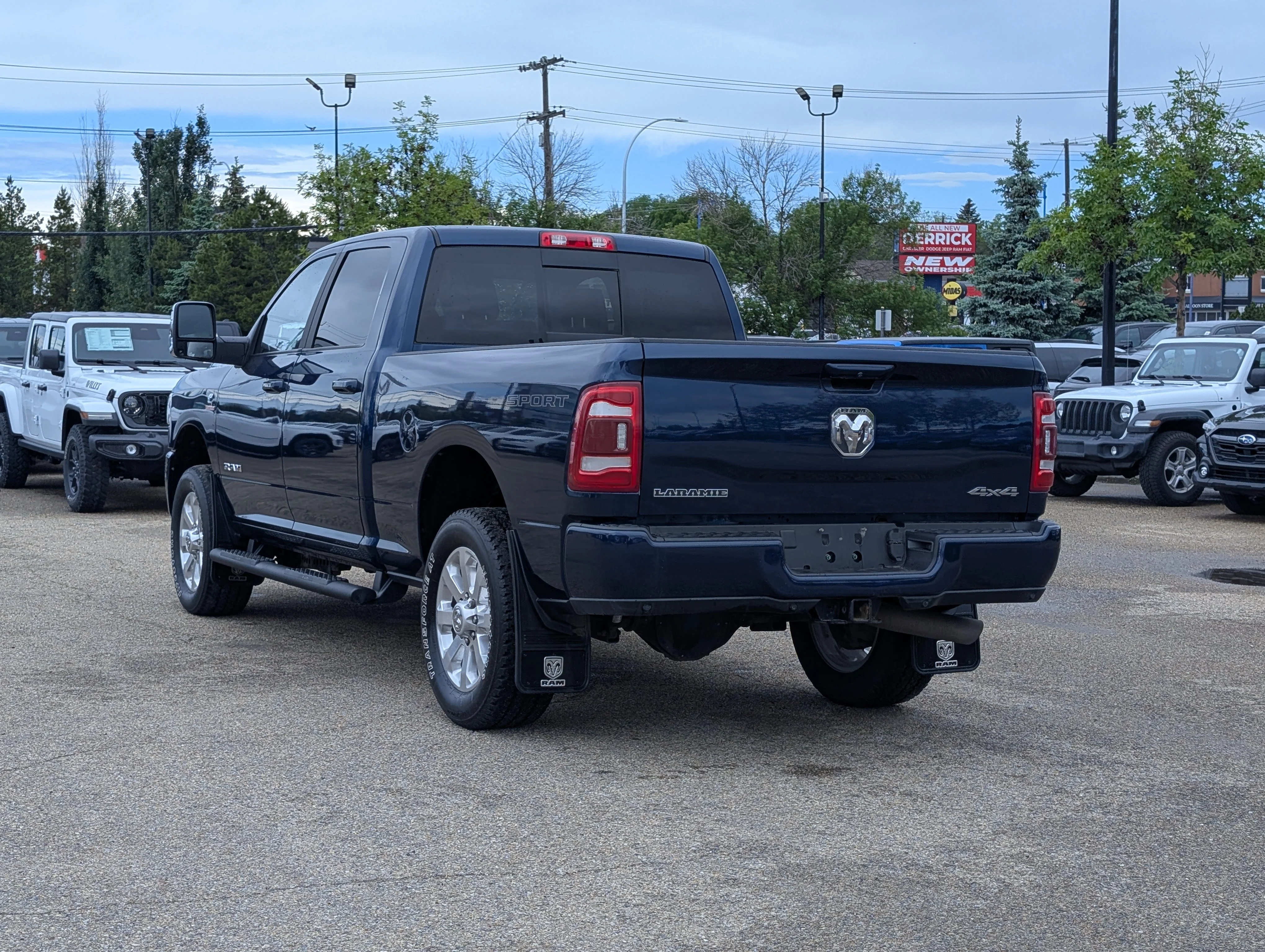 Used 2023 Patriot Blue Pearl Ram Laramie image 4