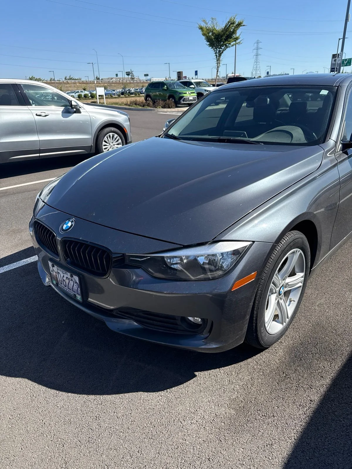 Used 2015 Gray BMW 320i xDrive image 1