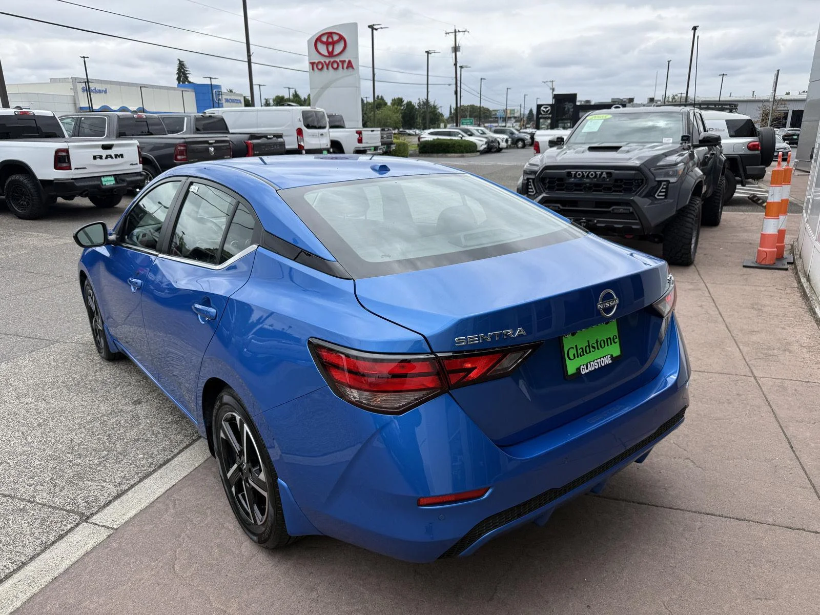Used 2024 Electric Blue Metallic Nissan SV image 4