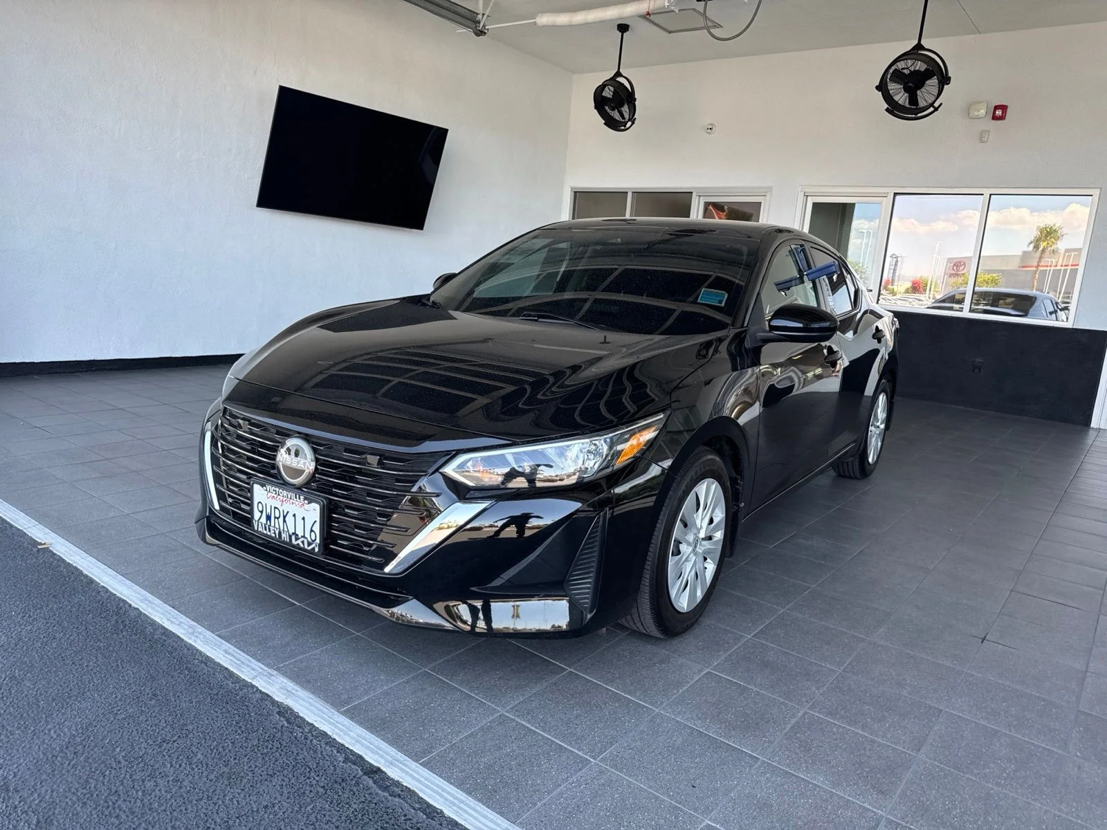 Used 2025 Super Black Nissan S image 2