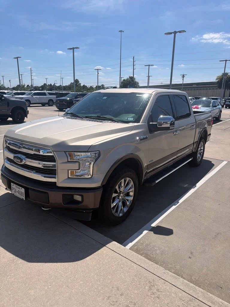Used 2017 Gold Ford Lariat image 1