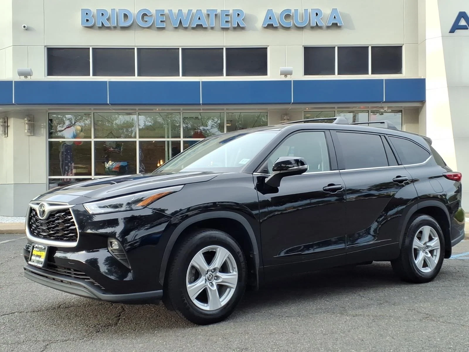 Used 2022 Midnight Black Metallic Toyota LE image 1