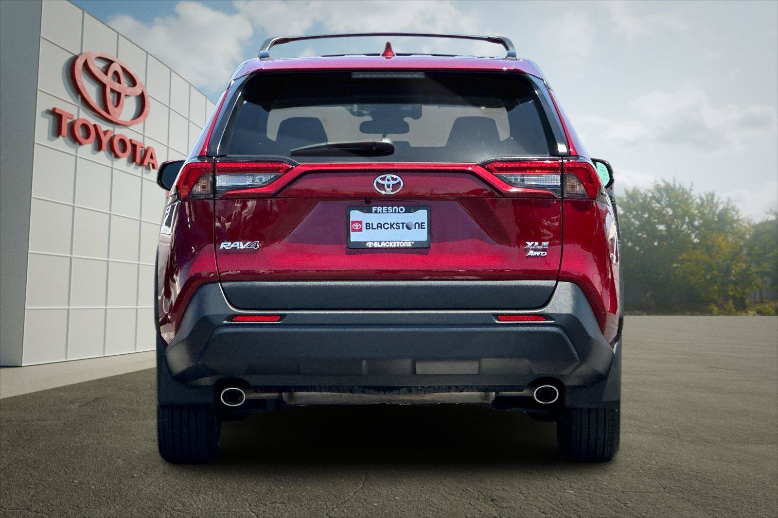 Certified Used 2025 Ruby Flare Pearl Toyota XLE image 4