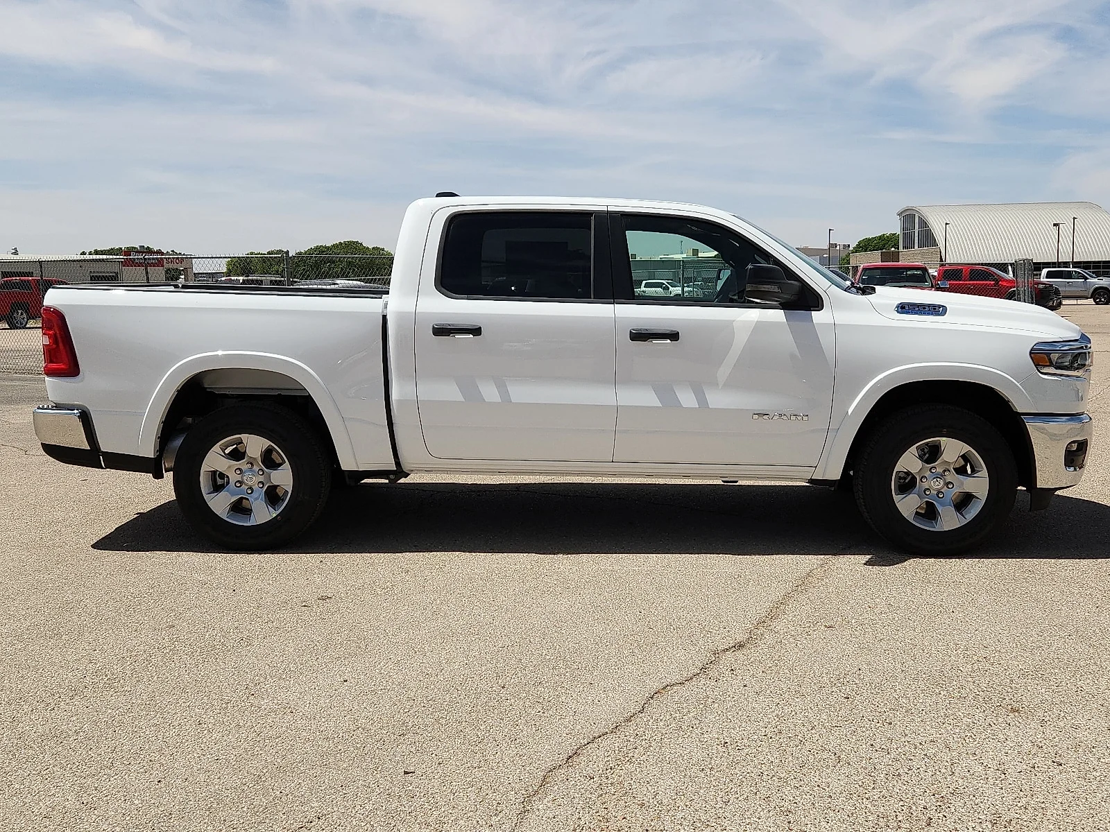 New 2026 Bright White Clearcoat Ram LONE STAR CREW CAB 4X4 5