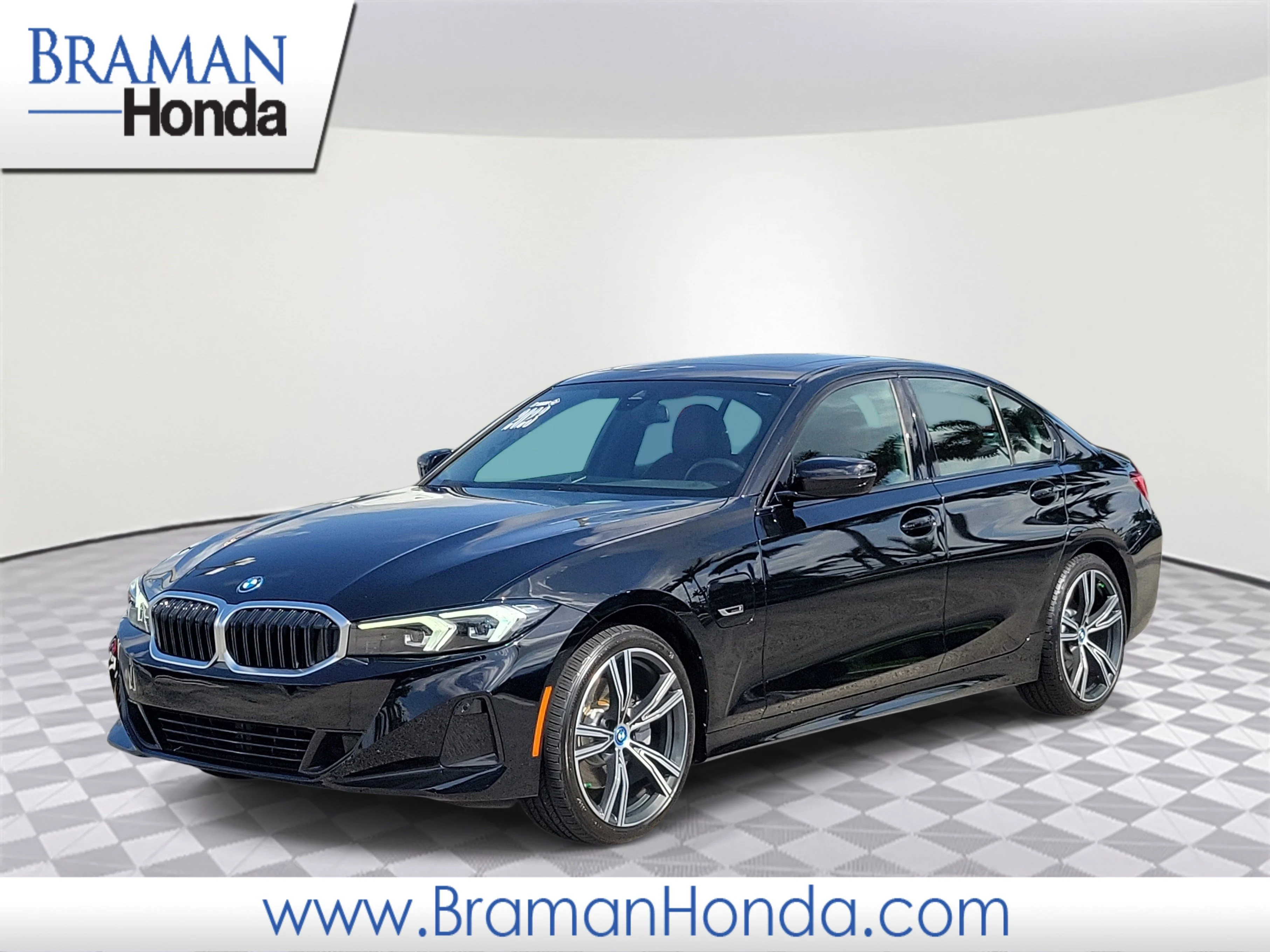 Used 2023 Jet Black BMW 330e xDrive image 1
