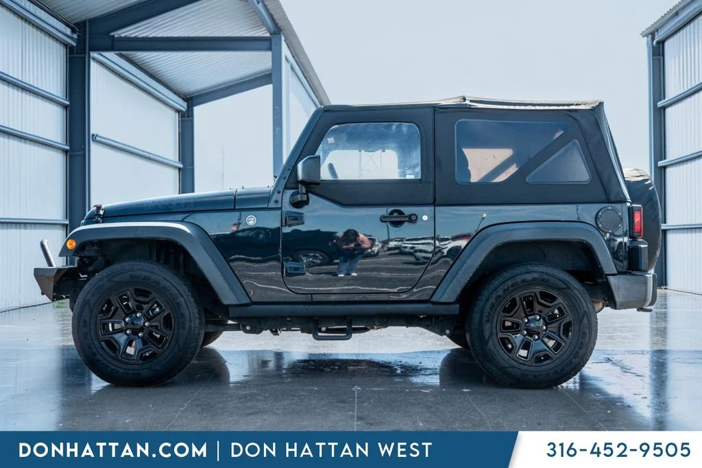 Used 2016 Jeep Wrangler Willys Wheeler with VIN 1C4AJWAG9GL198022 for sale in Park City, KS