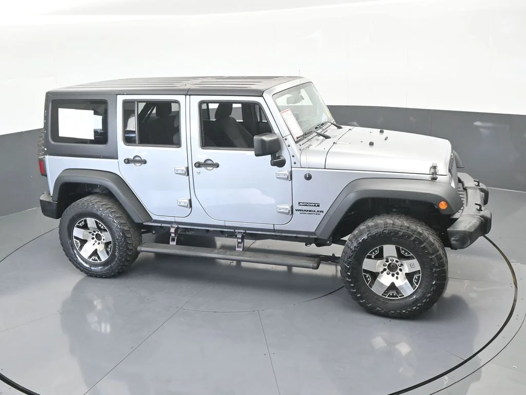 Used 2016 Billet Silver Metallic Clearcoat Jeep Unlimited Sport image 43