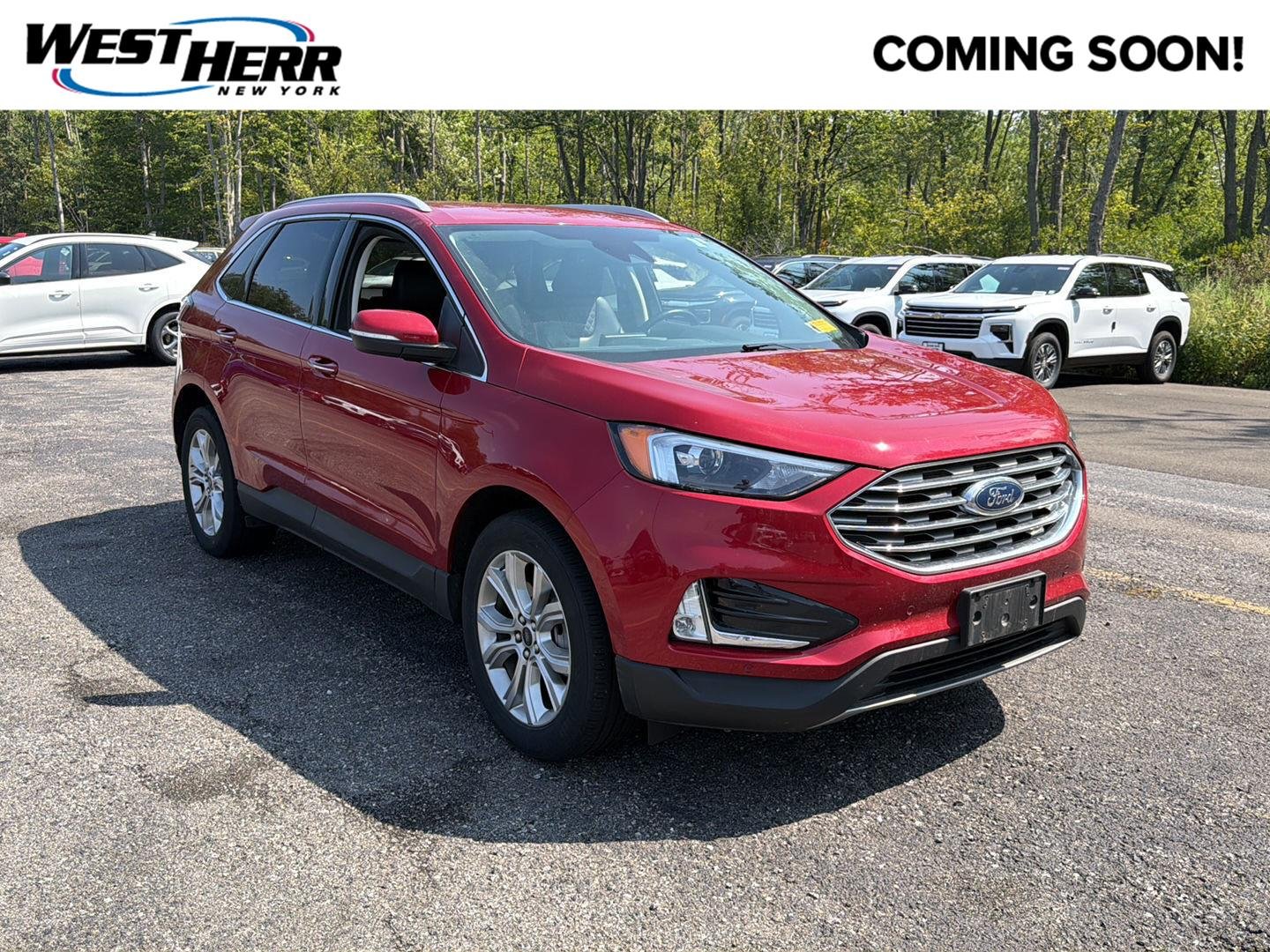 Used 2024 Rapid Red Metallic Tinted Clearcoat Ford Titanium image 1