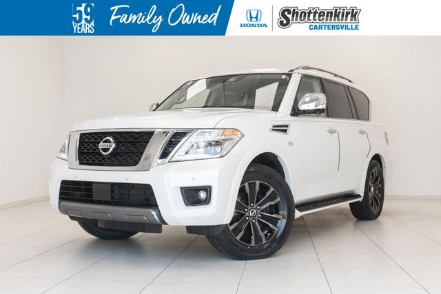 Used 2019 White Nissan Platinum image 1