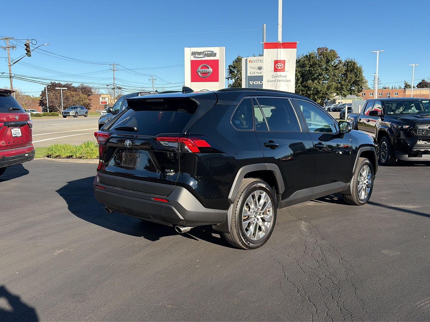 Used 2025 Midnight Black Metallic Toyota XLE Premium image 3