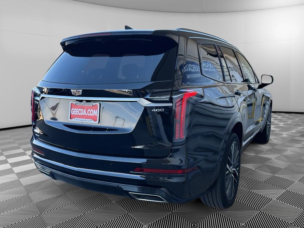 Used 2023 Stellar Black Metallic Cadillac AWD Sport image 4