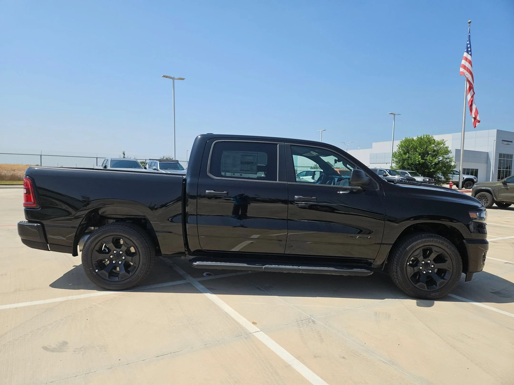 New 2026 Diamond Black Crystal Pearlcoat RAM Express image 2