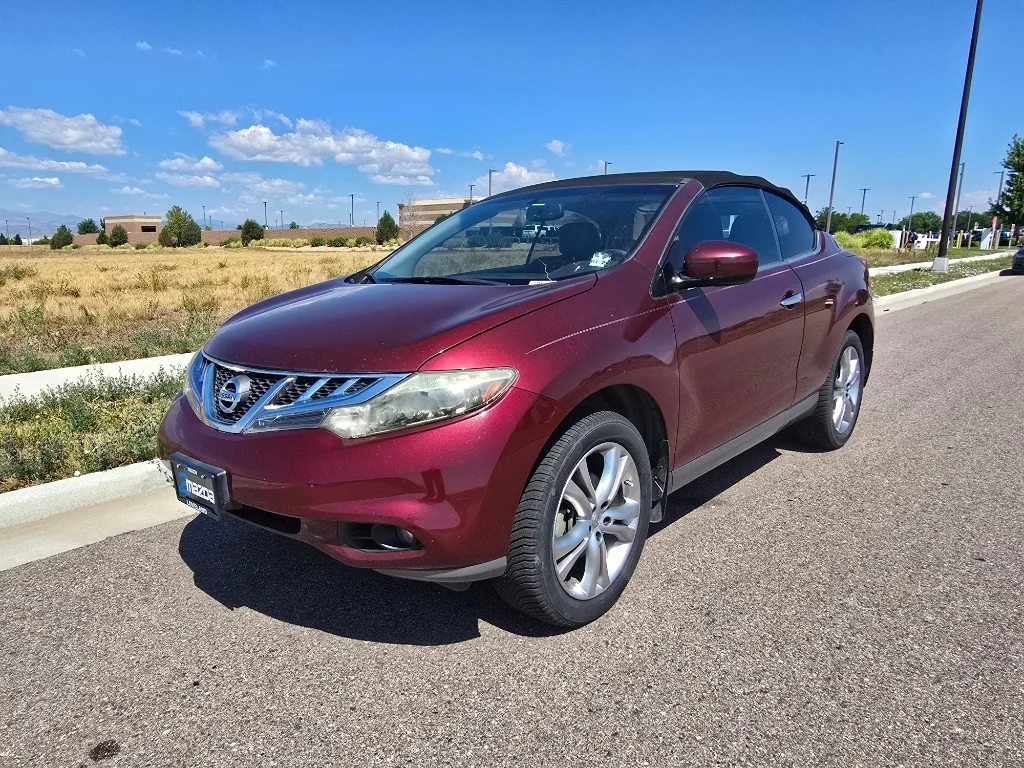 Used 2011 Merlot Metallic Nissan Base image 1