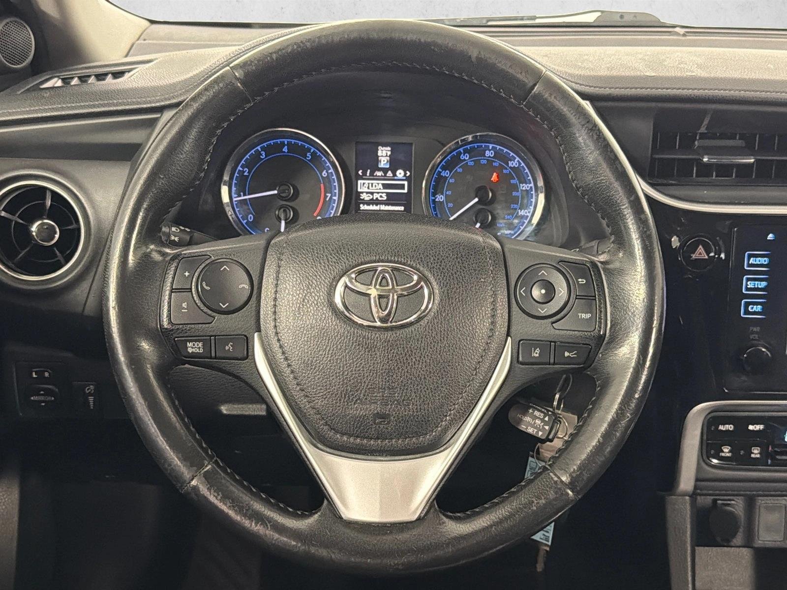 Used 2018 Black Sand Pearl Toyota SE image 23