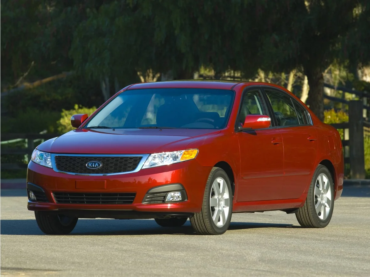 Used 2009 Brown Kia LX image 1