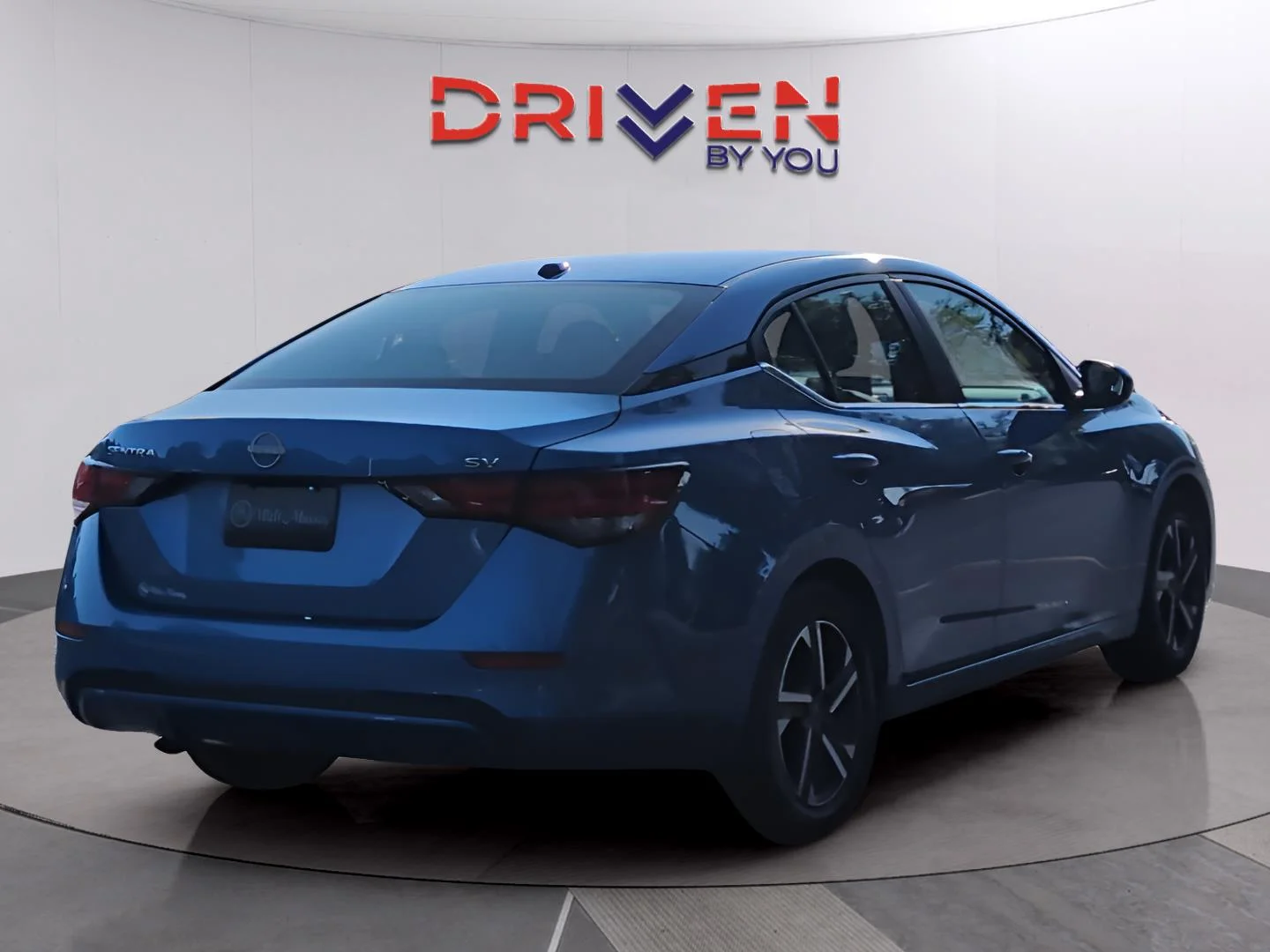 Used 2024 Electric Blue Metallic Nissan SV image 5