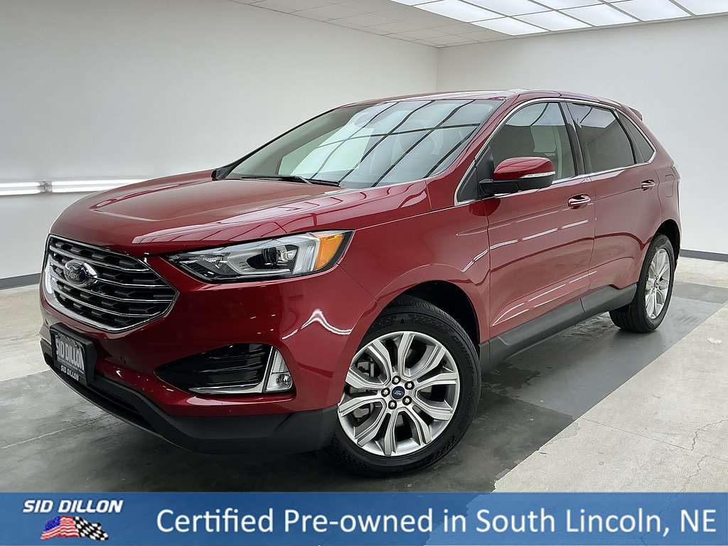 Certified Used 2021 Rapid Red Metallic Tinted Clearcoat Ford Titanium image 1
