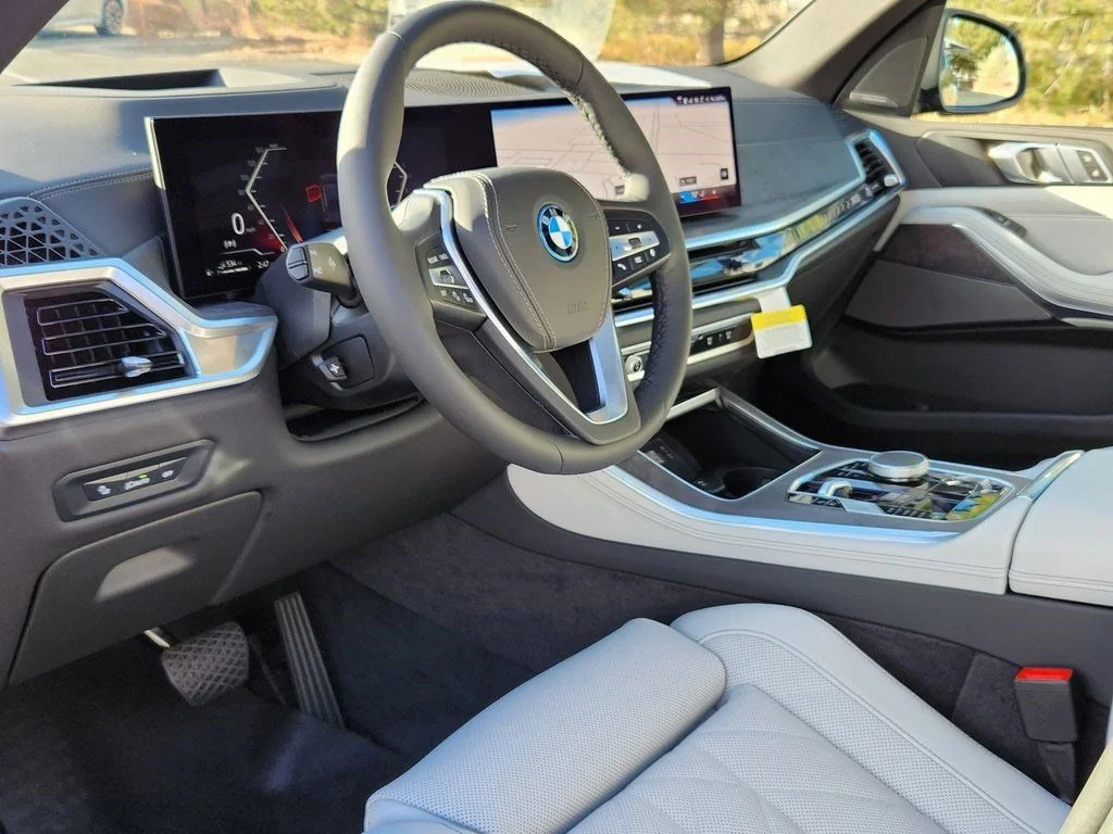 Used 2026 Black Sapphire Metallic BMW xDrive50e image 9