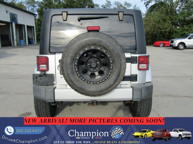 Used 2012 Silver Jeep Unlimited Sahara image 5