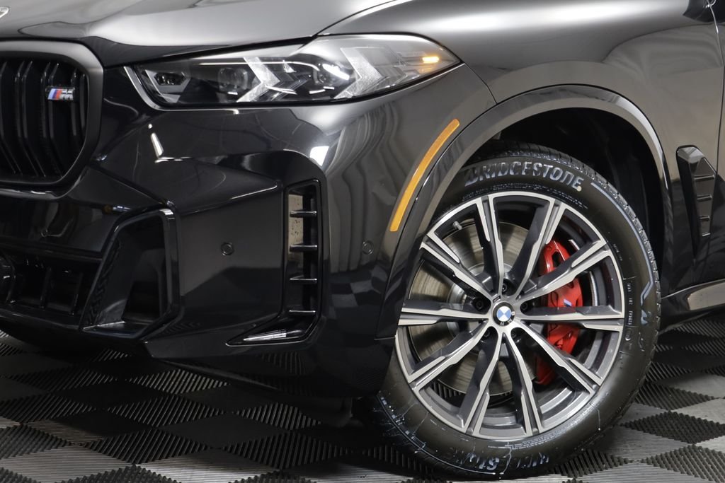 New 2026 Black Sapphire Metallic BMW M60i image 4