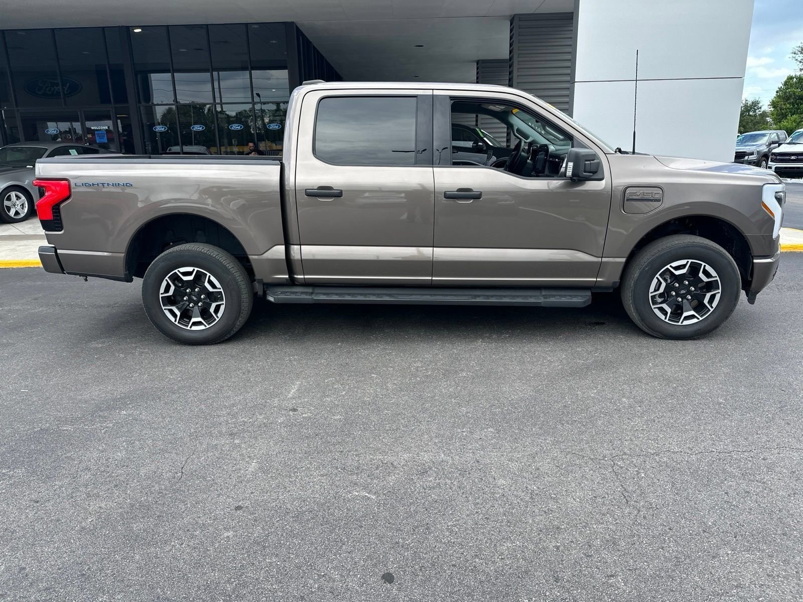 Used 2023 Ford F-150 Lightning XLT with VIN 1FTVW1EL6PWG58751 for sale in Spring Hill, FL