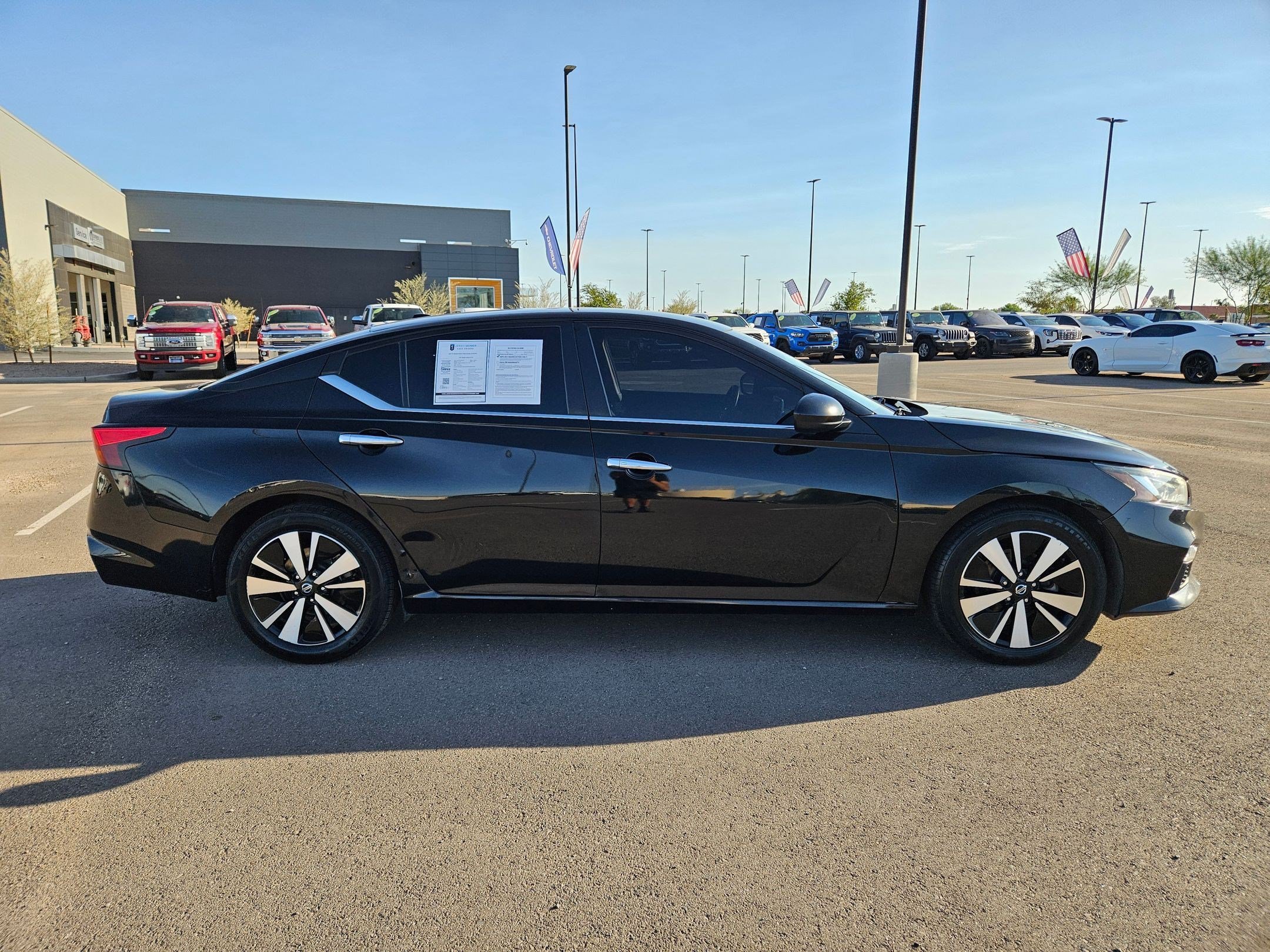Certified Used 2021 Black Nissan SV FWD image 6
