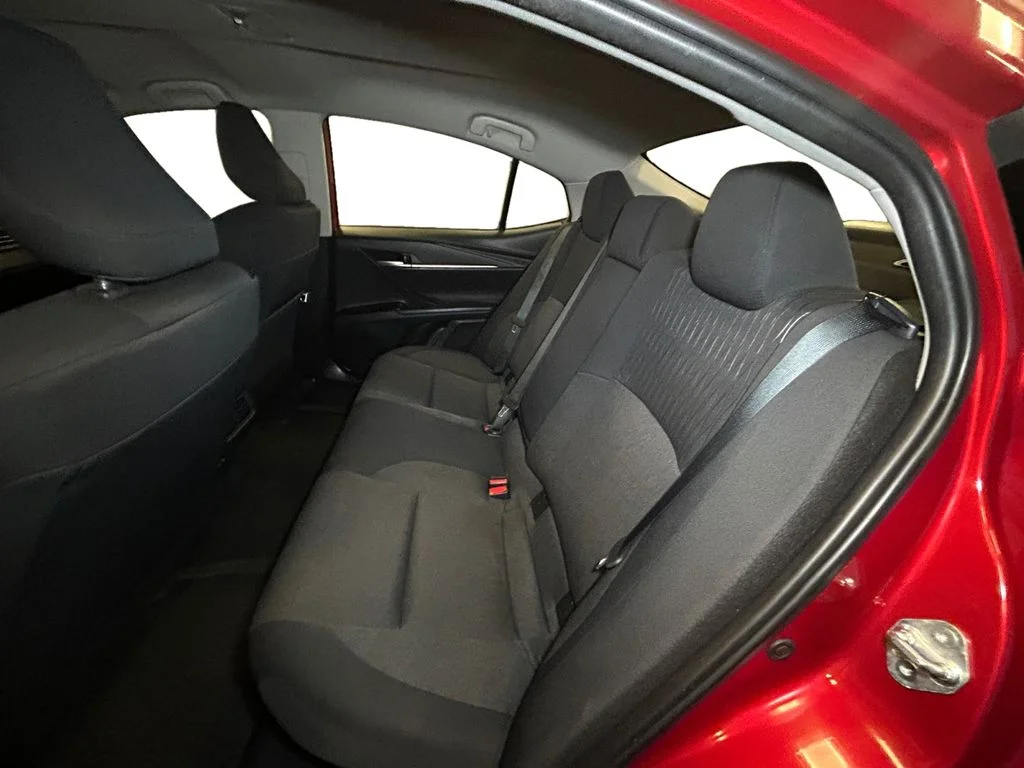 Used 2025 Supersonic Red Toyota LE image 13