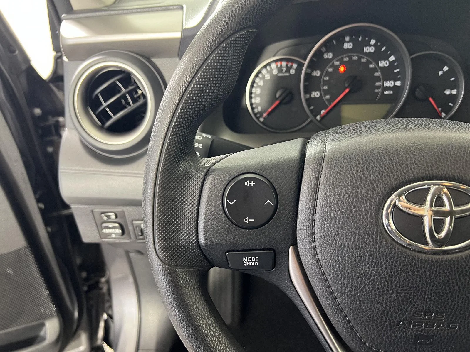 Used 2016 Magnetic Gray Metallic Toyota LE image 19