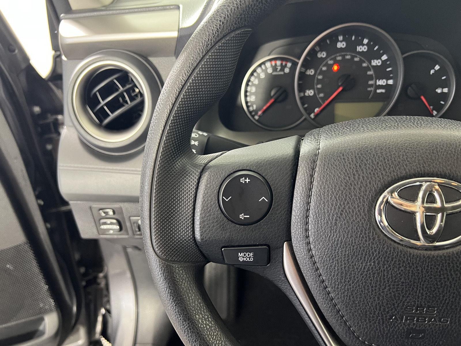 Used 2016 Magnetic Gray Metallic Toyota LE image 19