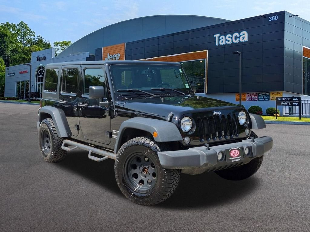 Used 2016 Black Jeep Unlimited Sport image 1