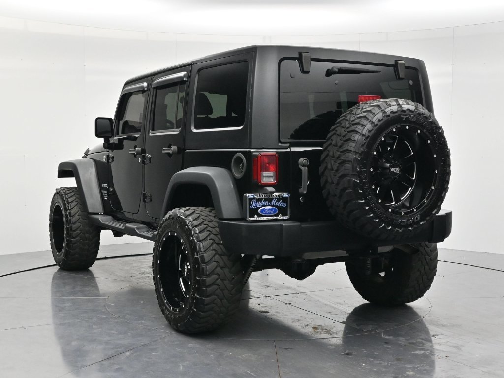 Used 2014 Black Clearcoat Jeep Unlimited Sport image 7