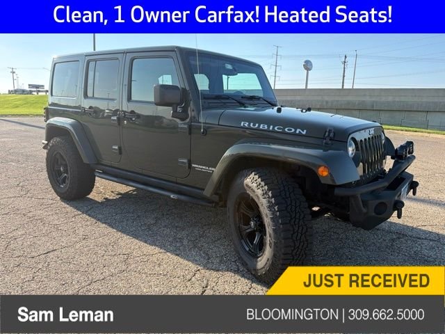 Used 2015 Green Jeep Unlimited Rubicon image 1