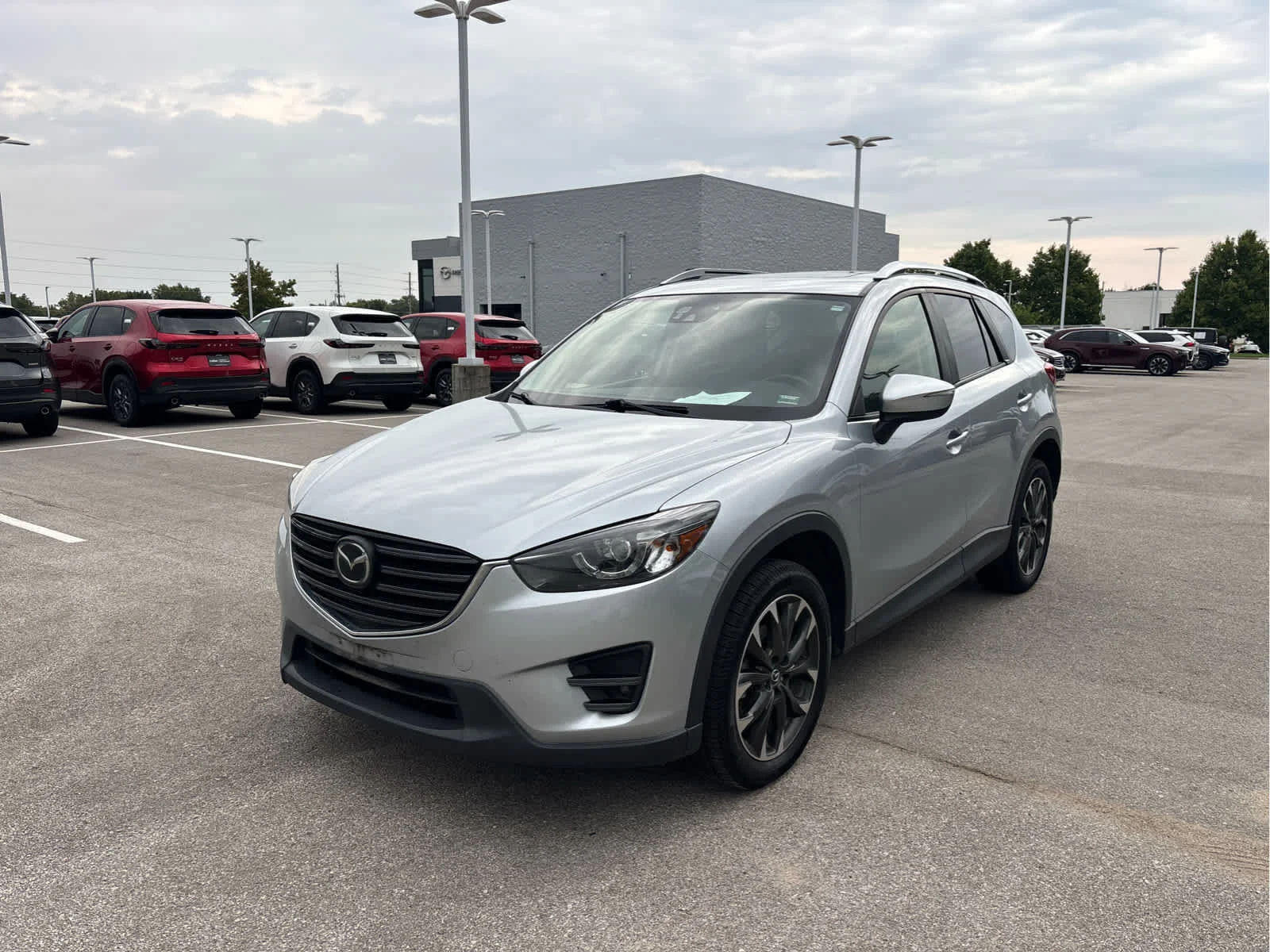 Used 2016 Mazda CX-5 Grand Touring with VIN JM3KE4DY3G0640948 for sale in Kansas City