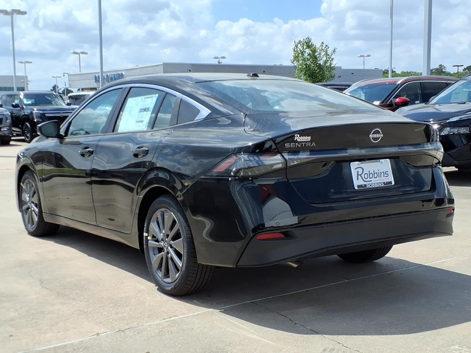 2026 Nissan Sentra SL Black at Robbins Nissan