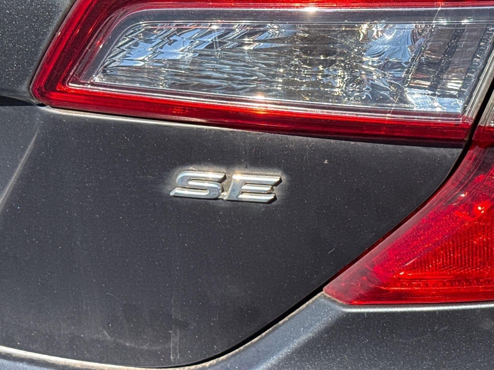 Used 2014 Magnetic Gray Metallic Toyota SE image 11