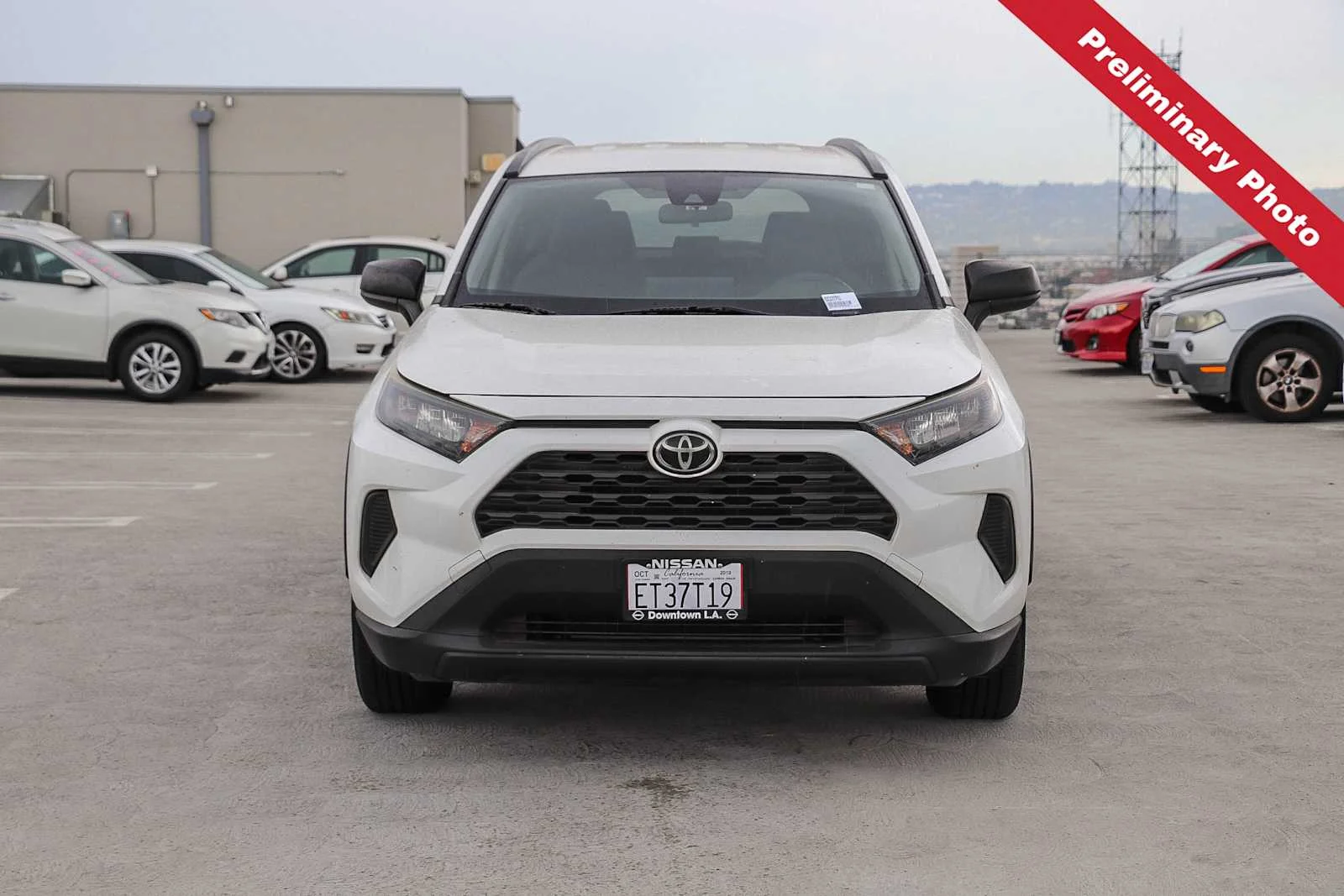 Used 2019 Super White Toyota LE image 2