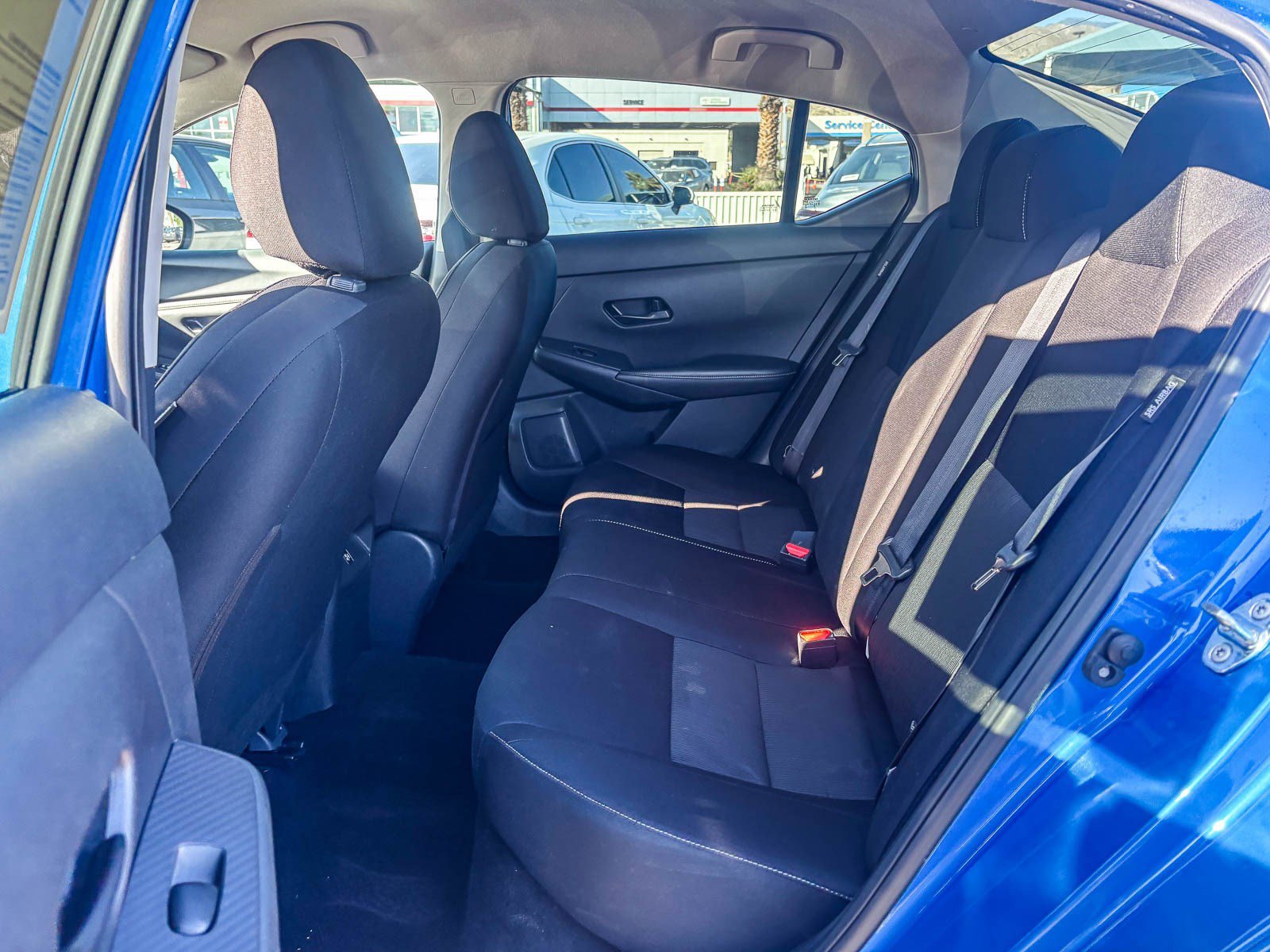 Used 2024 Electric Blue Metallic Nissan SV image 21