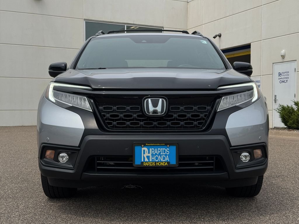 Used 2021 Honda Passport Touring with VIN 5FNYF8H96MB036494 for sale in Coon Rapids, Minnesota