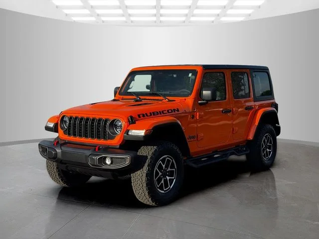 Certified Used 2025 Orange Jeep Rubicon image 3