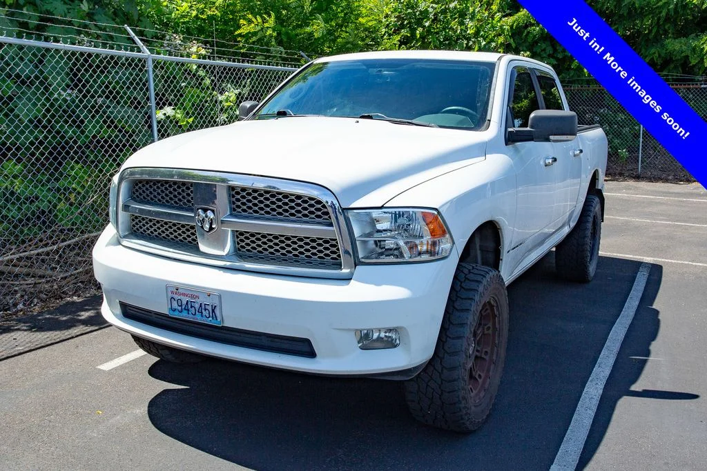 Used 2012 Bright White Clearcoat Ram Laramie Longhorn image 1