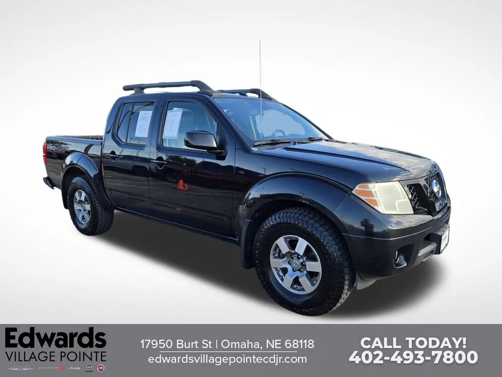 Used 2011 Black Nissan PRO-4X image 1