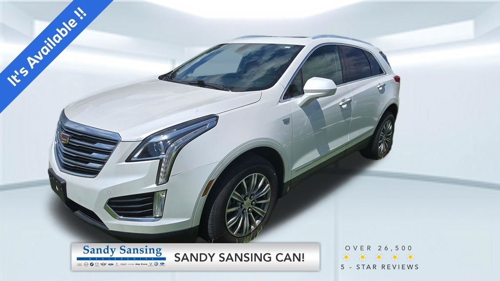 Used 2017 Crystal White Cadillac Luxury image 1