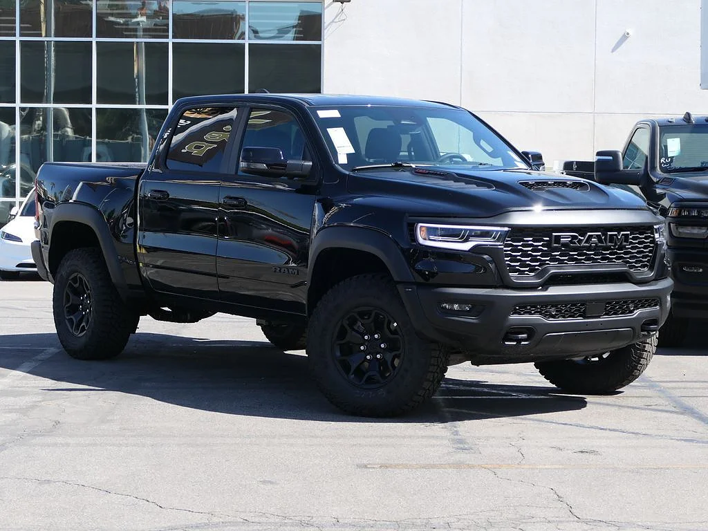 New 2026 Diamond Black Crystal Pearl Coat RAM RHO Crew Cab 4x4 5