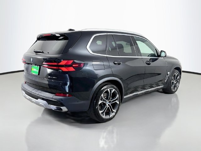 Used 2024 Black Sapphire Metallic BMW sDrive40i image 7