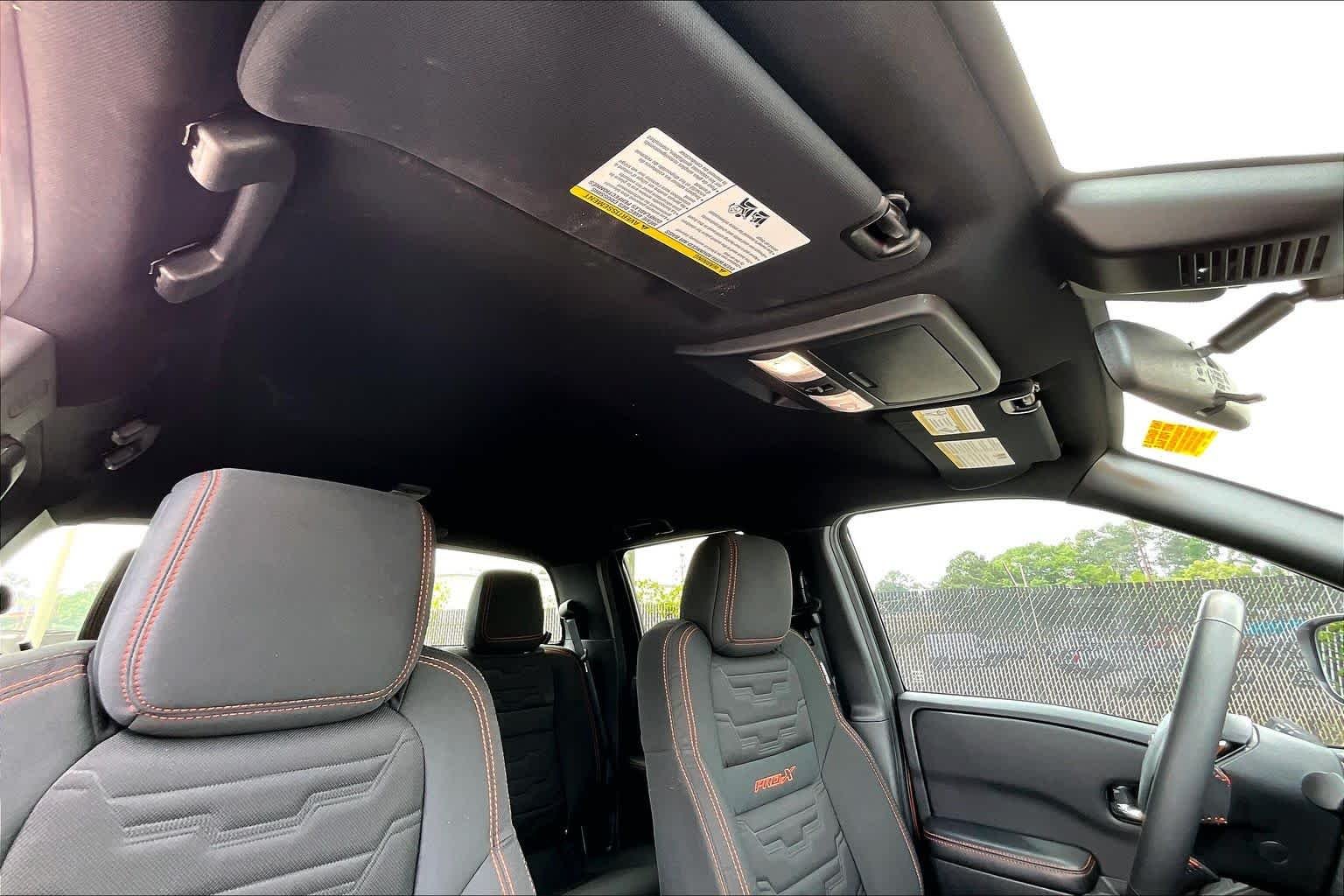 Used 2025 Afterburn Orange Nissan PRO-X image 25