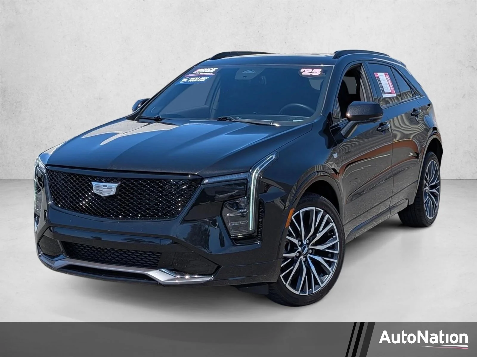 Used 2025 Stellar Black Metallic Cadillac FWD Sport image 1