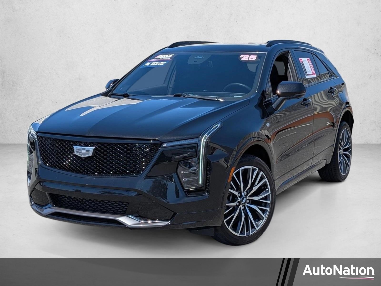 Used 2025 Stellar Black Metallic Cadillac FWD Sport image 1