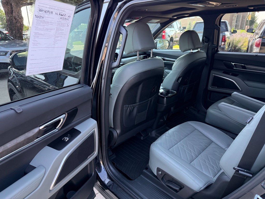 Used 2024 Ebony Black Kia EX X-Line image 14