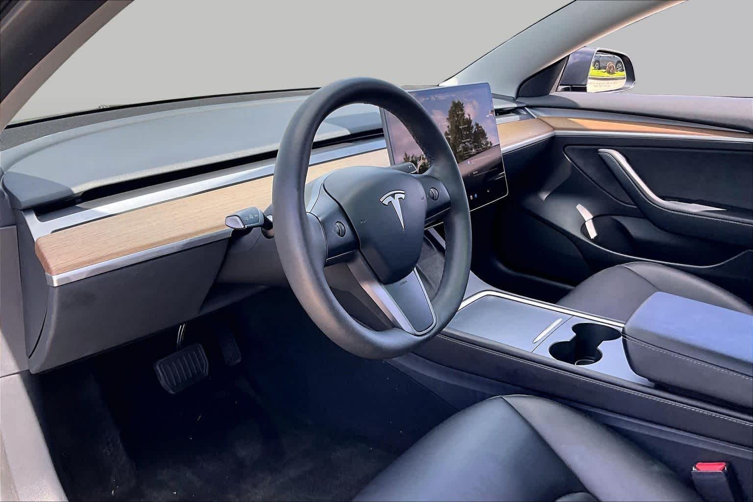 Used 2023 Solid Black Tesla  image 14