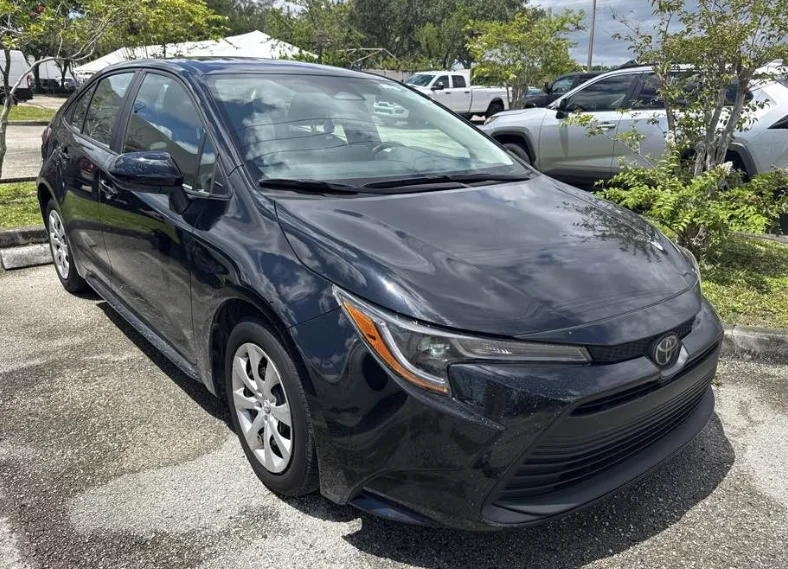 Used 2024 Black Toyota LE image 4